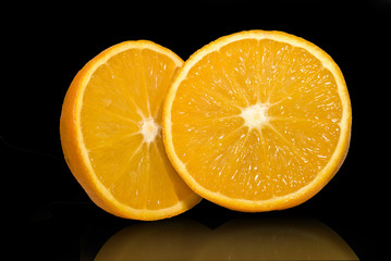 oranges over black