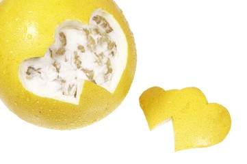 hearts cut out from grapefruit isolated on white background
