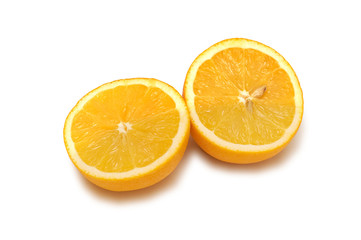 Two piecies of orange isolated on white