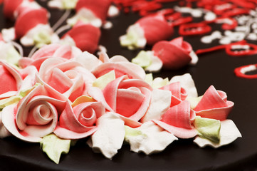 Close up of rose decoration on the cake