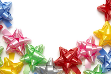 Plenty of colorful bows on a white background