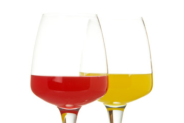 Two glasses with beverages, isolated on white background