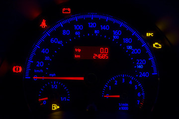 Fototapeta premium odometer of european car in red and blue