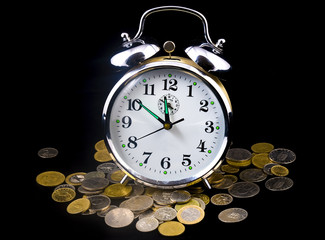 alarm clock on coins