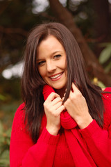 Young woman in red sweater