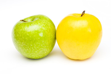 Fresh green and yellow apples at white background