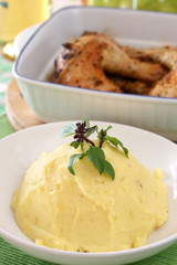 Mash potato with basil heaped up and smoothed off 