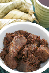 A dry curried and spiced ‘Rendang Tok’ of Malay origins 