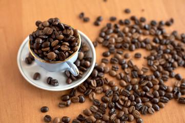 Still life of coffee grains and pieces of service