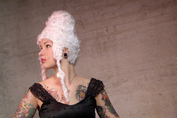 woman with white peruke and tattoo