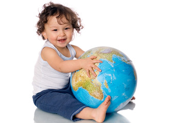 Happy baby with globe.