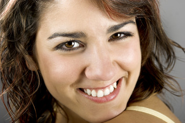 A close-up portrait  of a beautiful young and attractive woman