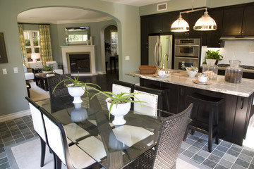 Luxury home kitchen with a breakfast table.