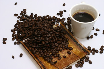 coffee seeds with white cup