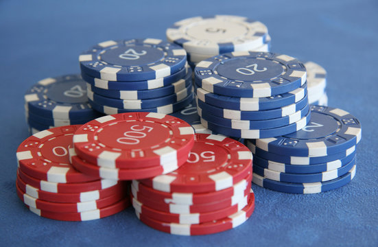 A selection of pokerchips on a poker table
