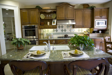Luxury kitchen with a modern granite island.