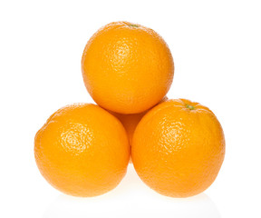 Four oranges isolated