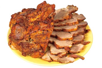 Sliced of baked pork on the yellow dish.