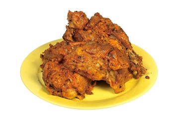 Baked pork in paprika isolated on white background