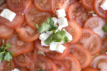 Light snack from tomatoes with soft cheese