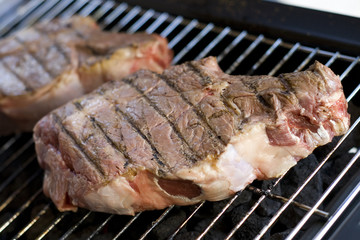 Cooking barbecue steak