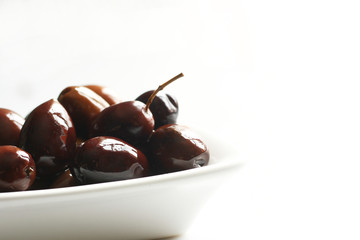 Olives on white background