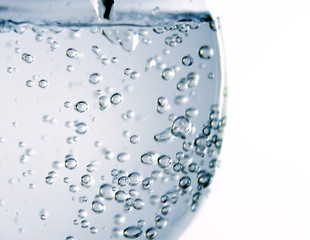 Pouring fresh water in glass