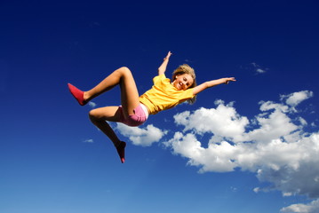 Girl jumping in air