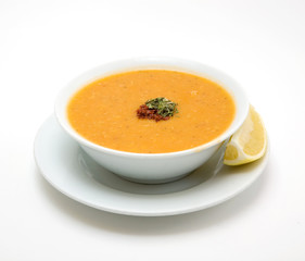 tomato soup with vegetables on white background