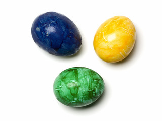 yellow blue green easter eggs isolated with clipping path