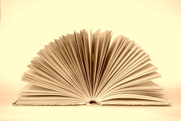 open book on sepia background