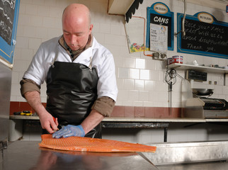 slicing smoked salmon 