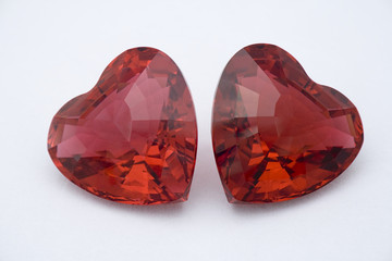 Two Red Crystal Hearts on white background