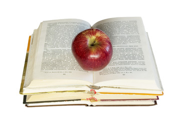 Red apple and stack of books 