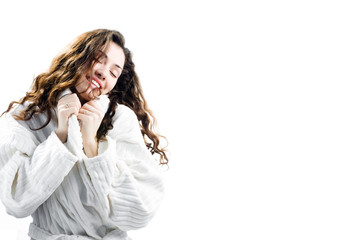 Fototapeta premium girl in a bathrobe on the wite backgraund