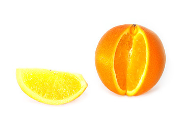 Sweet orange and its slice isolated on white