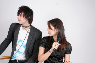 Couple singing and playing