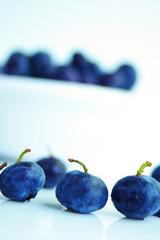 Blueberries closeup and in a bowl