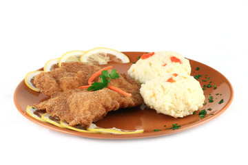 close up of a pork schnitzel in a plate