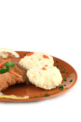 close up of a pork schnitzel in a plate