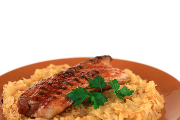 close up of a bacon with potatoes or cabbage in a plate