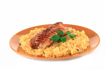 close up of a bacon with potatoes or cabbage in a plate