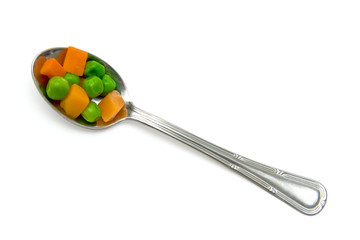 Orange carrot and green peas boiled and mixed