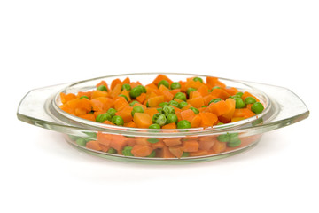Orange carrot and green peas boiled and mixed