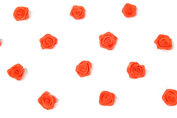 Small Red Roses Scattered on White