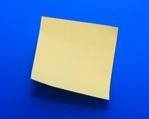 Yellow note paper on a blue background