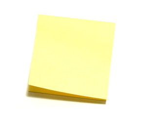 Yellow note paper on a on a white background