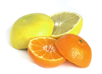 Grapefruit and orange halves isolated on the white background.