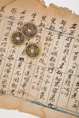 antique chinese book page and coin for background