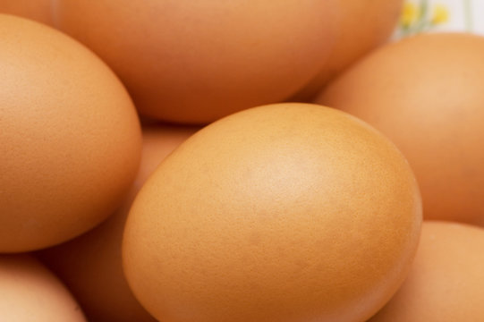Close up of brown eggs with shallow DOF